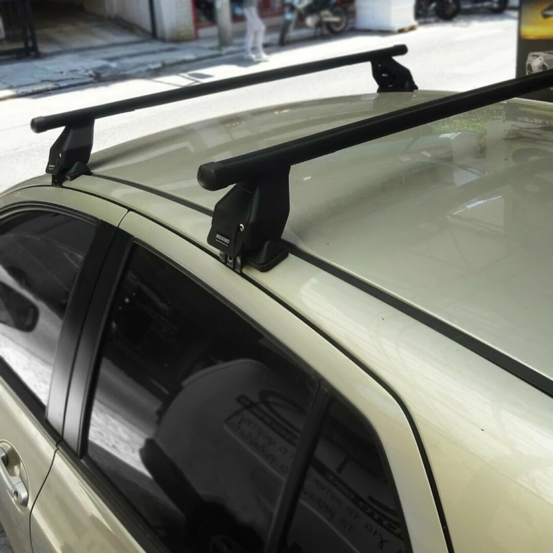 Menabo Μπάρες Οροφής Ατσάλινες για Toyota Yaris για Αυτοκίνητα με Εργοστασιακές Μπάρες (Σετ με πόδια και κλειδαριά)